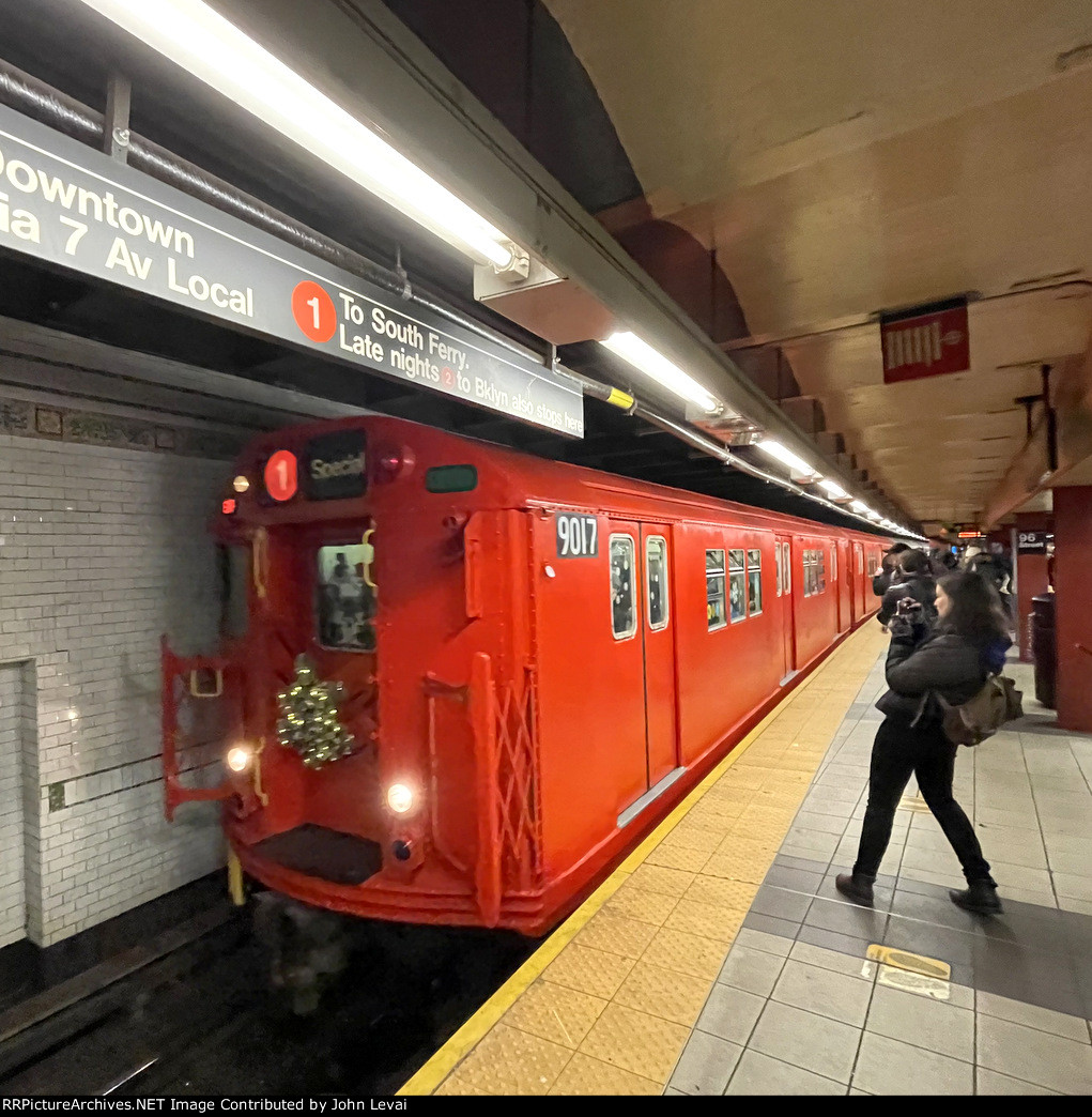 The holiday train arrives into 96th St Station heading to Chambers St